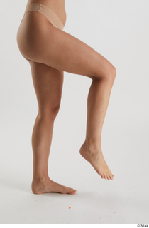 Babbie  1 flexing leg nude side view 0003.jpg